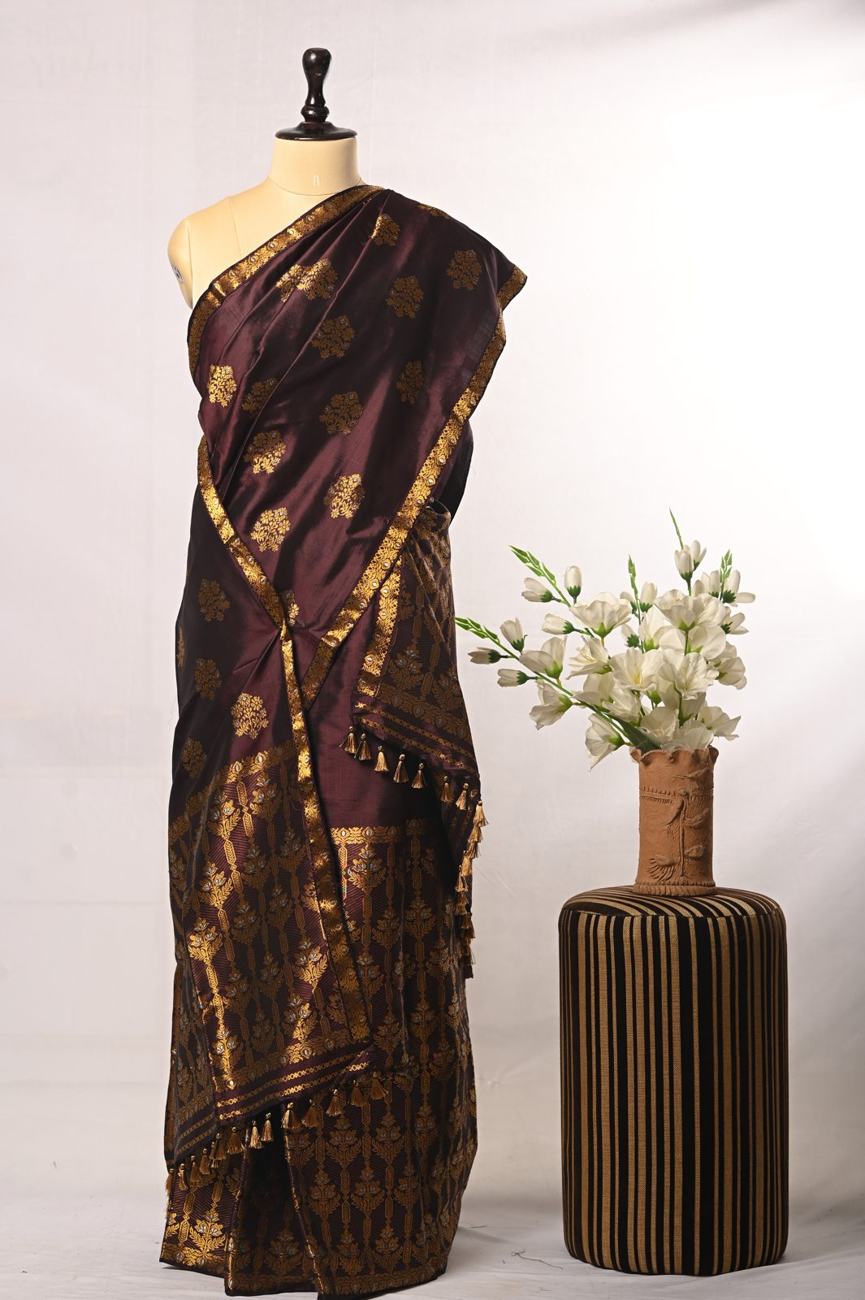 Wine silk saree with woven gold motifs and tassels